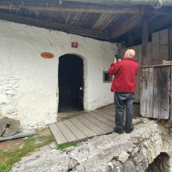 Guided ancestral tour explaining local Slovenian histor