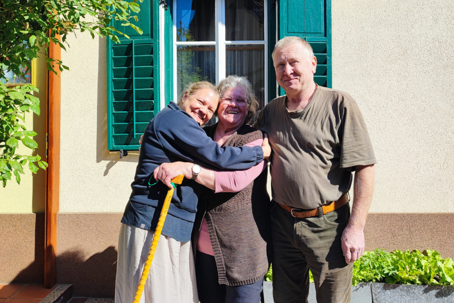 Pam Cesen meeting relatives in Slovenia during an ancestral tour to her great-grandmother's family homestead